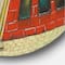 Designart - Red Facade of Shop In Paris II - French Country Metal Circle Wall Art